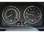 BMW 1-Serie 120i Executive * WINTER/ZOMER BANDEN * STOELVERWARMING * APK 2026 *