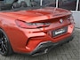 BMW 8-Serie M850i 531pk xDrive High Executive Sunset Orange 4W Sturing Carbon Core