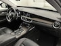 Alfa Romeo Stelvio First Edition 280 pk Automaat | Navigatie | Achteruitrijcamera | Lederen Bekleding | Voorstoelen Verwarmd | Bi-Xenon Koplampen | Keyless Entry/Start | Dodehoek Detectie | Premium Audio | 20" Lichtmetalen Velgen | Apple Carplay/Android Auto |