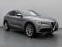 Alfa Romeo Stelvio First Edition 280 pk Automaat | Navigatie | Achteruitrijcamera | Lederen Bekleding | Voorstoelen Verwarmd | Bi-Xenon Koplampen | Keyless Entry/Start | Dodehoek Detectie | Premium Audio | 20" Lichtmetalen Velgen | Apple Carplay/Android Auto |