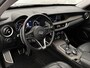 Alfa Romeo Stelvio First Edition 280 pk Automaat | Navigatie | Achteruitrijcamera | Lederen Bekleding | Voorstoelen Verwarmd | Bi-Xenon Koplampen | Keyless Entry/Start | Dodehoek Detectie | Premium Audio | 20" Lichtmetalen Velgen | Apple Carplay/Android Auto |