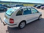 Skoda Fabia Combi 1.4-16V Spirit+, Airco, Cruise control, Radio/CD, Elektrische ramen, Elektrische spiegels, voorstoelen in hoogte verstelbaar, Stuurwiel verstelbaar, Centrale vergrendeling met AB, Trekhaak, Originele NL auto, Dealer onderhouden