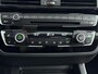 BMW 1-Serie 118i Executive Aut. | ACTIE! | Leer | Schuifdak | Stoelverwarming | Trekhaak | 17" Lm-wielen | Navigatie | Camera | Adaptive cruise |