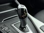 BMW 1-Serie 118i Executive Aut. | ACTIE! | Leer | Schuifdak | Stoelverwarming | Trekhaak | 17" Lm-wielen | Navigatie | Camera | Adaptive cruise |