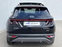 Hyundai Tucson 1.6 T-GDI PHEV 265pk Premium Sky 4WD / 100% Dealer onderhouden / Trekgewicht 1.350 kg / Elektrisch Glazen schuif- en kanteldak / Elektrische achterklep / Camera 360° / Apple Carplay & Android Auto / Stuur- en stoelverwarming voor en achter / Stoelverkoeling / Krell Soundsystem / Adaptieve Cruise Control / Parkeersensoren voor en achter / Keyless Entry / Ski-luik