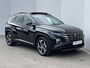 Hyundai Tucson 1.6 T-GDI PHEV 265pk Premium Sky 4WD / 100% Dealer onderhouden / Trekgewicht 1.350 kg / Elektrisch Glazen schuif- en kanteldak / Elektrische achterklep / Camera 360° / Apple Carplay & Android Auto / Stuur- en stoelverwarming voor en achter / Stoelverkoeling / Krell Soundsystem / Adaptieve Cruise Control / Parkeersensoren voor en achter / Keyless Entry / Ski-luik