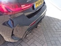 BMW 1-Serie M135i xDrive M Aerodynamica 306 Pk - KEYLESS ENTRY-GO| ADAPTIEF LED| NAVIGATIE| GROOTLICHT ASSISTENT| HEAD-UP DISPLAY|DODE HOEK SENSOR| AUTOMATISCHE AIRCO| ADAPTIEVE CRUISE CONTROL|PARKEERSENSOREN| STOELVERWARMING| STUURVERWARMING|