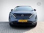 Nissan Ariya e-4ORCE Evolve 91 kWh | Panoramadak | Nappa Leder | 20'' Aerocover Velgen | Head-Up Display | BOSE Audio | Geheugenstoelen | Rijklaarprijs!
