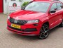 Skoda Karoq 1.5 TSI ACT Greentech 150pk DSG-7 Sportline Business/ Trekhaak/ 19 Inch velgen/ Keyless/ DAB/ Stoelverwarming/ Camera/ 1 Eigenaar/ Origineel NL/ NAP