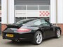 Porsche 911 3.6 Carrera 325PK NL AUTO/Climate/Cruise control/19'LM/Schuifdak/BOSE/Leder/Xenon/PDC/Sportuitlaat/NAP!