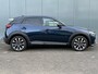Mazda CX-3 2.0 SkyActiv-G 120 GT-M Automaat Camera | Premium Audio | Climate control | Adaptive cruise control | Dodehoek detectie | Head-up display | Keyless entry | LED verlichting | Navigatie | Stoelverwarming | Stuurverwarming