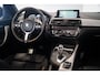 BMW 1-Serie M140i Edition Shadow High Executive | Schuifdak | H/K | Navi Prof. | Memory Seat | H/K | NL-Auto | Adapt. Onderst. |