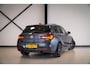 BMW 1-Serie M140i Edition Shadow High Executive | Schuifdak | H/K | Navi Prof. | Memory Seat | H/K | NL-Auto | Adapt. Onderst. |
