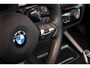 BMW 1-Serie M140i Edition Shadow High Executive | Schuifdak | H/K | Navi Prof. | Memory Seat | H/K | NL-Auto | Adapt. Onderst. |