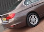 BMW 3-Serie 320i Executive | Clima | Cruise | Navi | PDC+Camera | Xenon | Multimedia | Start/Stop |