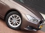 BMW 3-Serie 320i Executive | Clima | Cruise | Navi | PDC+Camera | Xenon | Multimedia | Start/Stop |