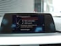 BMW 3-Serie 320i Executive | Clima | Cruise | Navi | PDC+Camera | Xenon | Multimedia | Start/Stop |