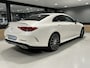 Mercedes-Benz CLS 450 4Matic AMG // Burmester // 360 Camera // Sunroof // Trekhaak // 20 inch // Designo White // Distronic