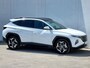 Hyundai Tucson 1.6 T-GDI HEV Premium Sky 230PK Automaat / Elektrisch Schuif/-Kanteldak / Lederen Bekleding / Elektrische Achterklep / Zwarte Lichtmetalen Winterset Tegen Meerprijs €599,-