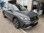 Volkswagen Tiguan 1.4 TSI eHybrid 2x R-Line / AUTOMAAT/ 245PK/ PANO/ KEYLESS/ ADAPT. CRUISE/ CLIMA 3 ZONE/ DIGITAL DASH/ NAVI/ DAB/ APP-CONNECT/ BLUETOOTH/ STOEL-STUUR VERWARM./ HEAD-UP DISPLAY/ RIJ-MODI/ PARK. SENSOREN
