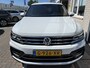 Volkswagen Tiguan Allspace 1.5 TSI 2x R-Line 7p. / AUTOMAAT/ 7-PERSOONS/ LEER/ CAMERA/ PARK. SENSOREN V+A/ TREKHAAK/ APP-CONNECT/ STOEL VERWARM./ KEYLESS/ VIRTUAL COCKPIT/ ELEK. ACHTERKLEP/ LED/ NAVI/ CLIMA/ DAB/ ACC/ 19" LMV