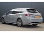 Toyota Corolla Touring Sports 1.8 Hybrid Executive | incl. 12 maanden garantie | Dodehoek detectie | Camera | Stoelverwarming | Navigatie | Sportstoelen | Zwarte hemel | LED | DAB+ | Draadloze telefoonlader | Climate control | 17" lmv | Parkeersensoren V+A | Head up display | Isofix | Adaptieve cruise control |
