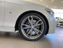 BMW 1-Serie M135i xDrive High Executive,Performance,6 Cilinder,Schuifkanteldak,Leder&Stoelverwarming,Harman Kardon,Navigatie,Achteruitrijcamera,Climate&Cruisecontrol,Spraakbediening,Keyless,18 Inch Lmv