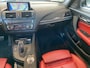 BMW 1-Serie M135i xDrive High Executive,Performance,6 Cilinder,Schuifkanteldak,Leder&Stoelverwarming,Harman Kardon,Navigatie,Achteruitrijcamera,Climate&Cruisecontrol,Spraakbediening,Keyless,18 Inch Lmv