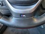BMW 1-Serie M135i xDrive High Executive,Performance,6 Cilinder,Schuifkanteldak,Leder&Stoelverwarming,Harman Kardon,Navigatie,Achteruitrijcamera,Climate&Cruisecontrol,Spraakbediening,Keyless,18 Inch Lmv