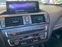 BMW 1-Serie M135i xDrive High Executive,Performance,6 Cilinder,Schuifkanteldak,Leder&Stoelverwarming,Harman Kardon,Navigatie,Achteruitrijcamera,Climate&Cruisecontrol,Spraakbediening,Keyless,18 Inch Lmv