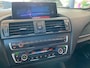 BMW 1-Serie M135i xDrive High Executive,Performance,6 Cilinder,Schuifkanteldak,Leder&Stoelverwarming,Harman Kardon,Navigatie,Achteruitrijcamera,Climate&Cruisecontrol,Spraakbediening,Keyless,18 Inch Lmv