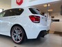 BMW 1-Serie M135i xDrive High Executive,Performance,6 Cilinder,Schuifkanteldak,Leder&Stoelverwarming,Harman Kardon,Navigatie,Achteruitrijcamera,Climate&Cruisecontrol,Spraakbediening,Keyless,18 Inch Lmv