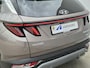 Hyundai Tucson 1.6 T-GDI HEV 230 pk Premium Sky Automaat / 1650kg Trekgewicht / Glazen schuif- en kanteldak / Stuur- en Stoelverwarming / Adaptief cruise control / Stoelventilatie voor / Rondomzicht camera / Elektrische bedienbare achterklep /