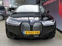 BMW iX xDrive50 BUSINESS ED. PLUS | 112 kWh | PANORAMA | CRYSTAL | TREKHAAK | LUCHTVERING | 1e EIG!!