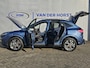 Ford Kuga 2.5-225pk PHEV ST-Line X Plug-in Hybrid. Garantie t/m 04-02-2028 ! Slechts 5.500km ! Volautm. airco dual, elektr. achterklep, LM wielen, stuur-, stoel- en voorraamverwarming, camera v+a,  side- en lane assist, adaptieve cruise cntrl, metallic lak, etc.