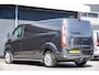 Ford Transit Custom L2H1 2.2Tdci 125Pk | Anniversary Edition | Stoel-Bank | Achteruitrijcamera | Trekhaak | Side Bars | 18'' | Magnetic Grey