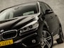 BMW 2-Serie Active Tourer 218i Sportline Automaat (NAVIGATIE, CLIMATE, PARKEERSENSOREN, LED KOPLAMPEN, SPORTSTOELEN, CRUISE, TREKHAAK, ELEK ACHTERKLEP, NIEUWSTAAT)