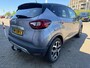 Renault Captur 0.9 TCe Intens met parkeersensoren en trekhaak en navigatie en bluetooth telefoon en airco en cruise controle