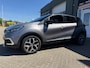 Renault Captur 0.9 TCe Intens met parkeersensoren en trekhaak en navigatie en bluetooth telefoon en airco en cruise controle