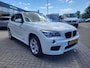 BMW X1 SDrive20i High Executive | AUTOMAAT | 1e eigenaar | Met o.a. climate, cruise control, panoramadak en navigatie!