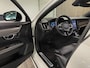 Volvo V90 T6 AWD Recharge Plus Dark Long Range | Trekhaak | 360° Camera | Crystal White | Schuifdak | Harman Kardon | Adaptieve Cruise Control | Stoel en Stuurwielverwarming | Full LED meesturende koplampen | Pilot Assist | BLIS Dode Hoek Detectie | Voorstoelen ele