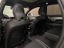 Volvo V90 T6 AWD Recharge Plus Dark Long Range | Trekhaak | 360° Camera | Crystal White | Schuifdak | Harman Kardon | Adaptieve Cruise Control | Stoel en Stuurwielverwarming | Full LED meesturende koplampen | Pilot Assist | BLIS Dode Hoek Detectie | Voorstoelen ele
