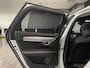 Volvo V90 T6 AWD Recharge Plus Dark Long Range | Trekhaak | 360° Camera | Crystal White | Schuifdak | Harman Kardon | Adaptieve Cruise Control | Stoel en Stuurwielverwarming | Full LED meesturende koplampen | Pilot Assist | BLIS Dode Hoek Detectie | Voorstoelen ele