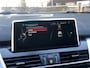 BMW 2-Serie Gran Tourer 218i Sport | Schuifdak, Leder, Navi, Stoelverw., Trekhaak, Cruise, Climate | Parelmoer | NAP |