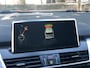 BMW 2-Serie Gran Tourer 218i Sport | Schuifdak, Leder, Navi, Stoelverw., Trekhaak, Cruise, Climate | Parelmoer | NAP |