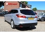 Ford Focus Wagon 125 Pk EcoBoost Titanium * Hele Mooie * * Navigatie * Achteruitrij Camera * Trekhaak * Stoel en voorruit verwarming * Lichtmetalen Velgen *  Voor en achter Parkeersensoren * Vingerhoets: Vierde Generatie Eersteklas Service !