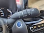 Toyota Yaris Cross 1.5 HYBRID AWD ADVENTURE NAVI HALF-LEDER/STOELVERW. TREEPLANKEN BLIND-SPOT PANODAK PARK-SENSOREN LED 18"LMV