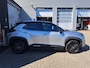 Toyota Yaris Cross 1.5 HYBRID AWD ADVENTURE NAVI HALF-LEDER/STOELVERW. TREEPLANKEN BLIND-SPOT PANODAK PARK-SENSOREN LED 18"LMV