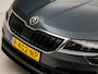 Skoda Karoq 1.5 TSI ACT Ambition Business 150Pk Automaat (APPLE CARPLAY, GROOT NAVI, CAMERA, TREKHAAK, SPORTSTOELEN, GETINT GLAS, PARKEERSENSOREN, CRUISE, NIEUWSTAAT)