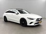 Mercedes-Benz CLA 180 AMG Pano Sfeerverl. Camera Carplay Virtual LED Memory Trekhaak Cruise Navi Clima PDC 18"LMV